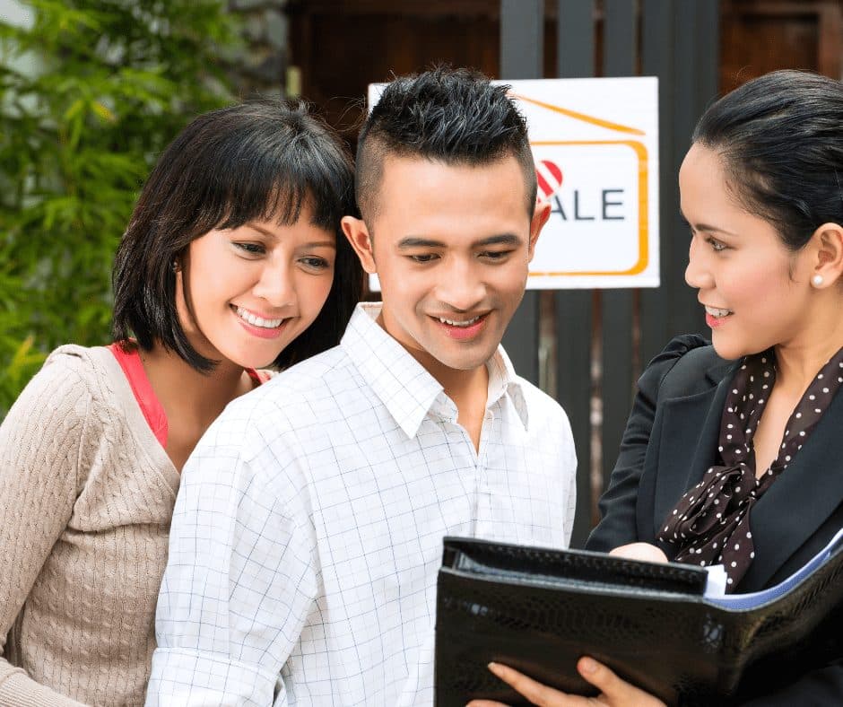 Landlord walking new tenants through house rules at move-in
